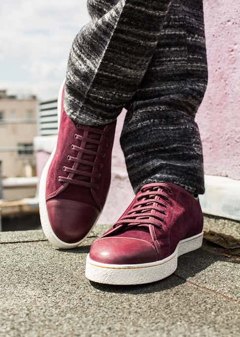 Levah burgundy suede and leather sneakers with white sole, John Lobb; charcoal melange horizontal stripe wool double-breasted suit.