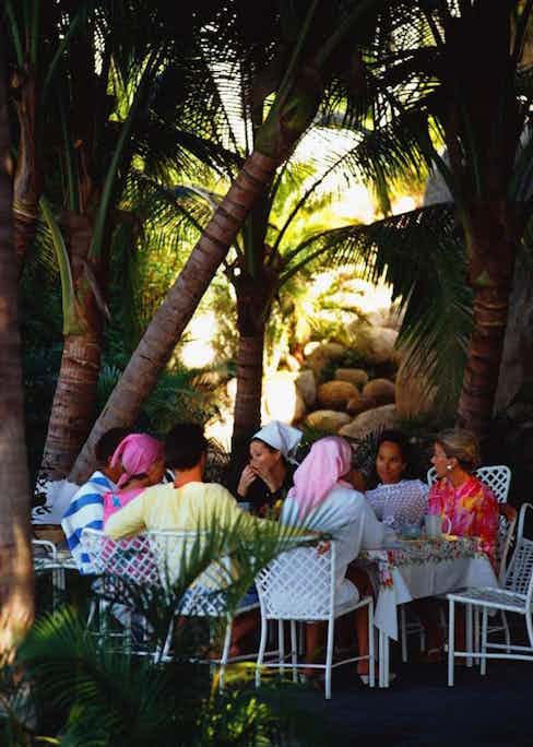 Film star Merle Oberon lunches with guests at her villa La Consentida, Acapulco (Photograph by Slim Aarons)