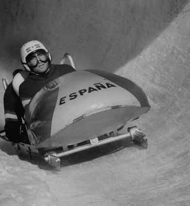 Spanish Sportsman, Alfonso De Marquis Portago, racing bobsled down icy course at fast clip during Winter Olympics. Photo by George Silk/The LIFE Picture Collection/Getty Images.