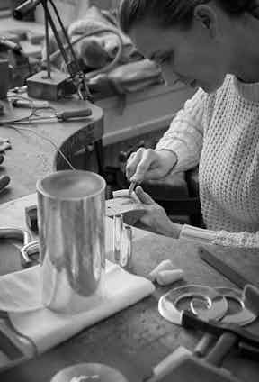 A piece from the Georg Jensen Bernadotte cocktail set being hand crafted.