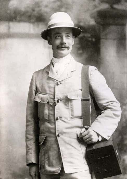 English photographer Horace Nicholls covered the Boer War and is seen here wearing an early incarnation of the safari jacket, artfully paired with a pocket watch across both chest pockets, circa 1900.