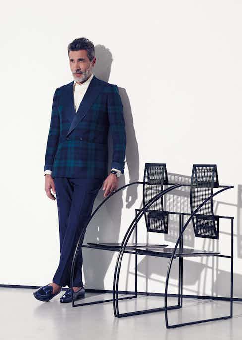 Black watch tartan double-breasted wool with silk lapel jacket, midnight blue wool evening trousers, and ivory cotton pleated front dress shirt*, all Chester Barrie; navy calf leather opera moccasin, Edhèn Milano.