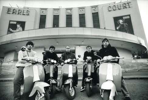 Oasis' band members on scooters at Earls Court, 1995.
