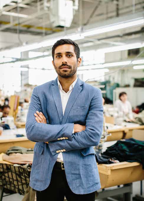 Mo Azam, Managing Director of Grenfell, on the factory floor in east London. Photo by Jamie Ferguson.