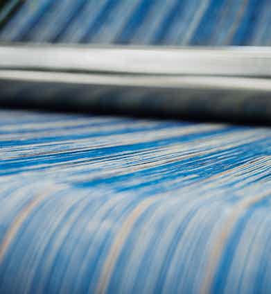 Yarns on the warping beam. Photograph by Luke Carby.