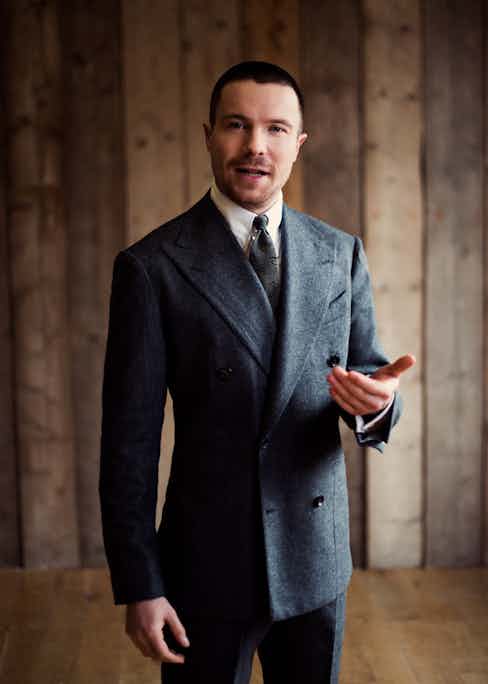 Charcoal grey wool double-breasted jacket and trousers, Dalcuore; ivory cotton shirt, Edward Sexton; grey silk printed vintage tie, property of The Rake.