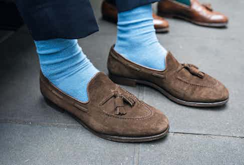 Northampton-based Crockett & Jones is one of Marvin’s favourite shoemakers, of which he has a number of pairs. “I think they’re great value shoes — well-constructed, comfortable and have great leather uppers.” These tassel loafers are crafted from chocolate brown suede, complemented by baby-blue socks.