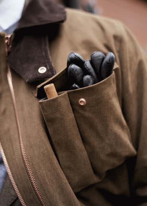 The breast pocket has been divided into two, allowing you a safe storage compartment for your gloves, sunglasses, cigar and other miscellaneous items.