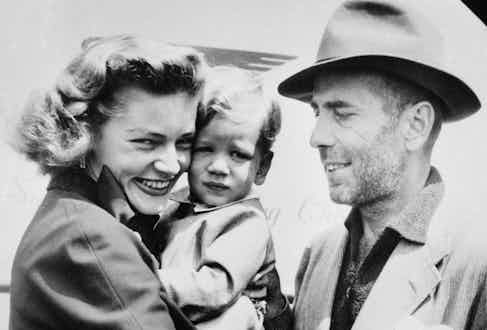 Mother and fatherare reunited with their two-year-old son, Stephen, at an airport in London after finishing the shooting of 1951's The African Queen. Image by © Bettmann/CORBIS