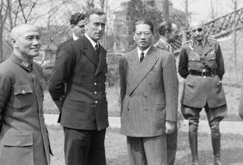 Supreme Allied Commander South East Asia: Mountbatten with General Chiang Kai-Shek and Dr T V Soong. In the background are Captain R V Brockman, Lt Gen F A M Browning and General Carton de Wiart VC at Chungking.