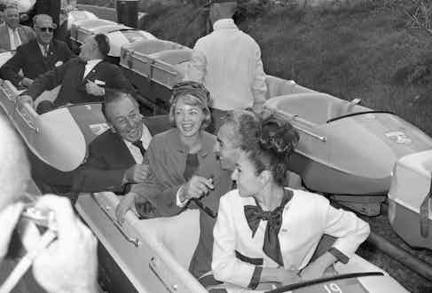 The Shah and Empress Farah hosted by Walt Disney at Disneyland, 1962 (Photo via Getty)