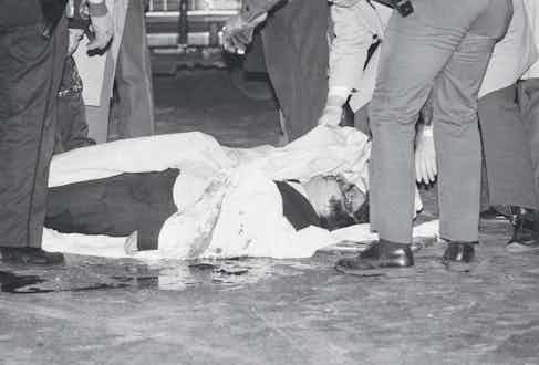 Paul Castellano lies dead on the floor in December 1985 (Photo via Getty)